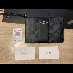 Coach Corner Zip Wristlet In Signature Canvas